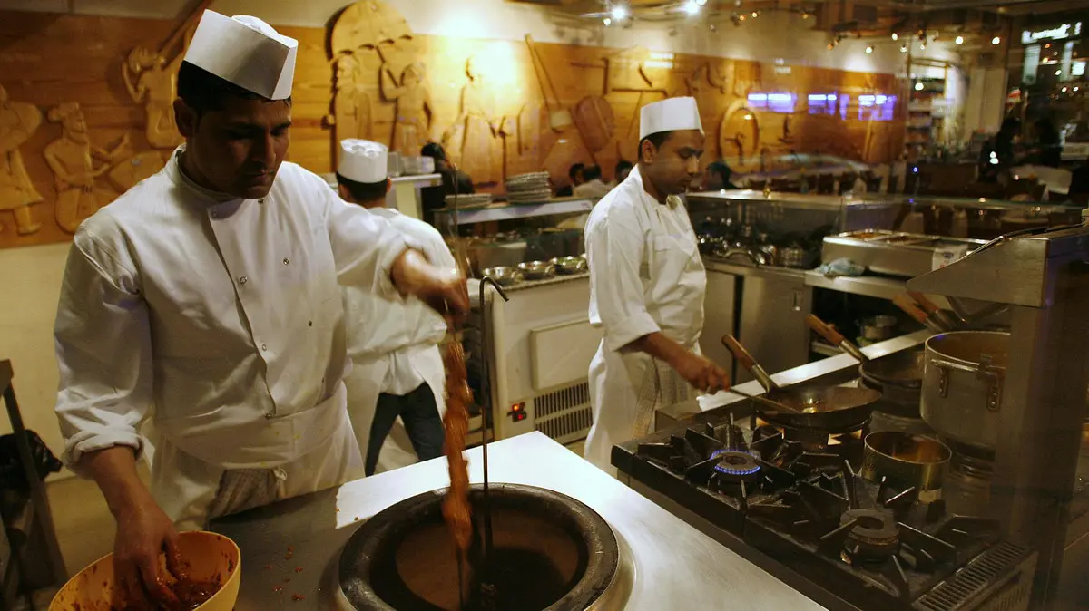 Foreign chef working legally in a Baku restaurant under an expert work permit