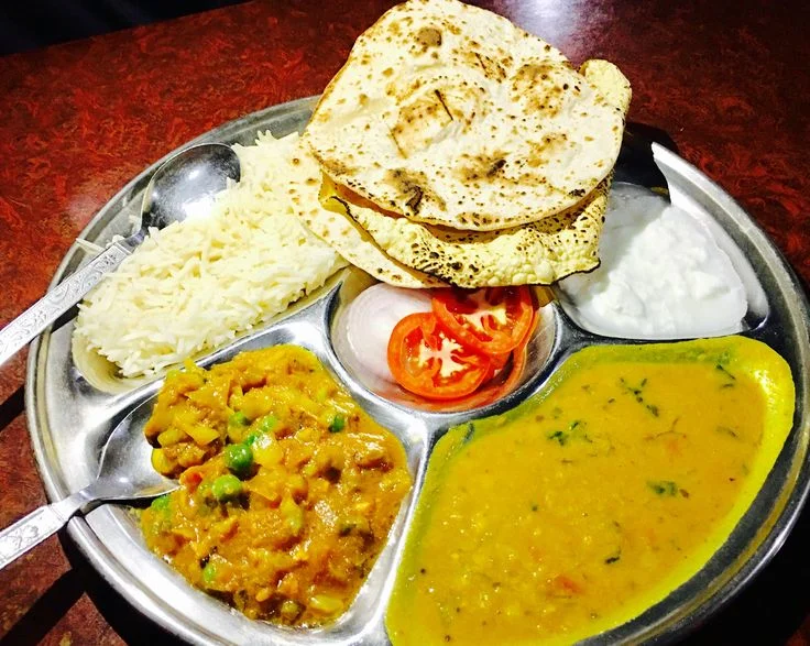 Traditional Azerbaijani chicken and lamb kebabs with grilled vegetables